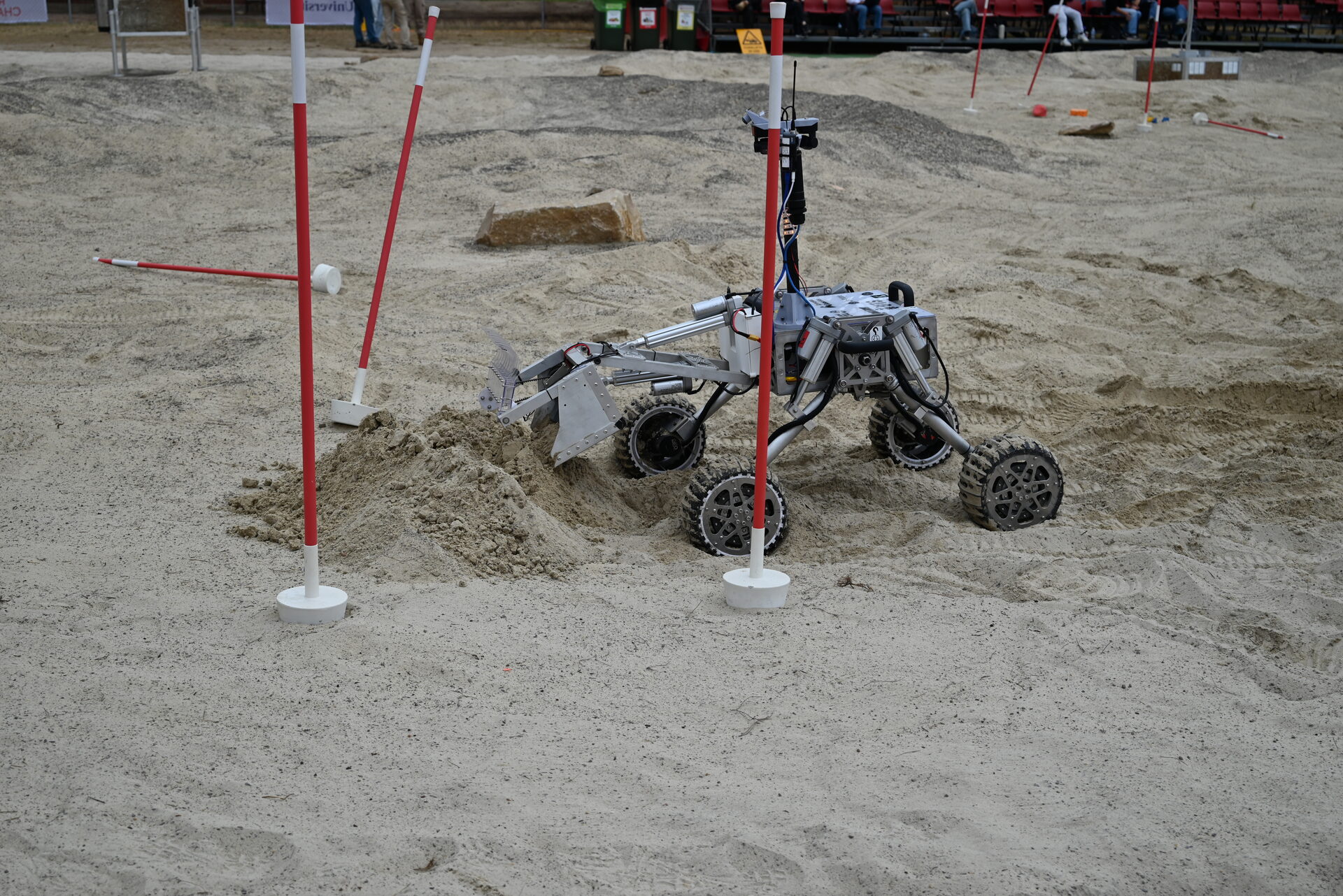 Rover dropping regolith during the excavation task